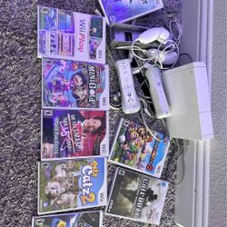 Nintendo Wii With 8+games 
