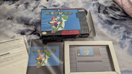 Super Mario world , super Nintendo CIB authentic