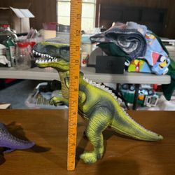 2 dinosaurs with lights