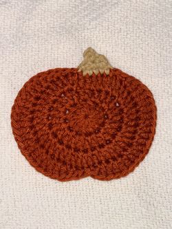 Handmade crochet pumpkin coasters