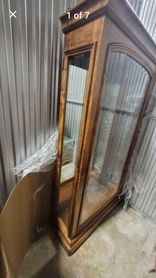 Vintage China Cabinet with lights. 4 solid glass shelves. Easy discreet glass side door for opening.75x42x15 measurements. STUNNING ALL GLASS 3 SHELVE