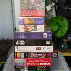 Puzzle Collection. 2 Unopened Puzzles Included! $50