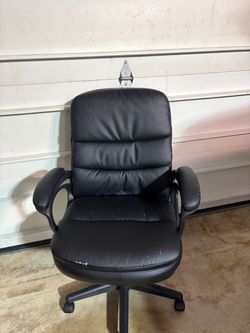 Black faux leather desk chair