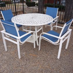 Outdoor patio table with chairs
