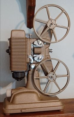 #1636, Revere 85 projector/case .