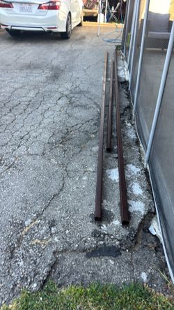 2 15 foot square steel tubes