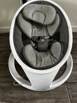 Munchkin Baby swing with music and motion