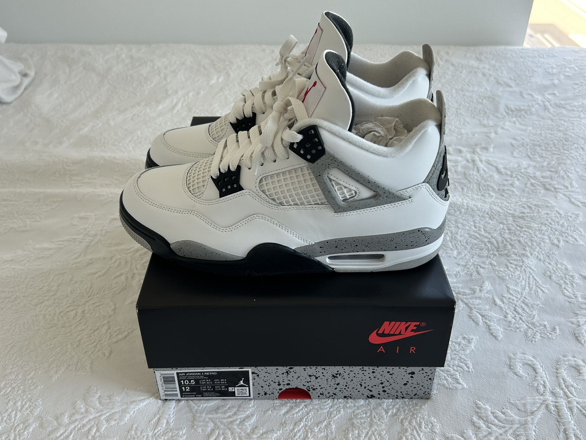 Jordan 4s White cement