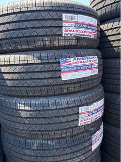 235/60/18 vendo set de llantas nueva con 50.000 millas de garantía