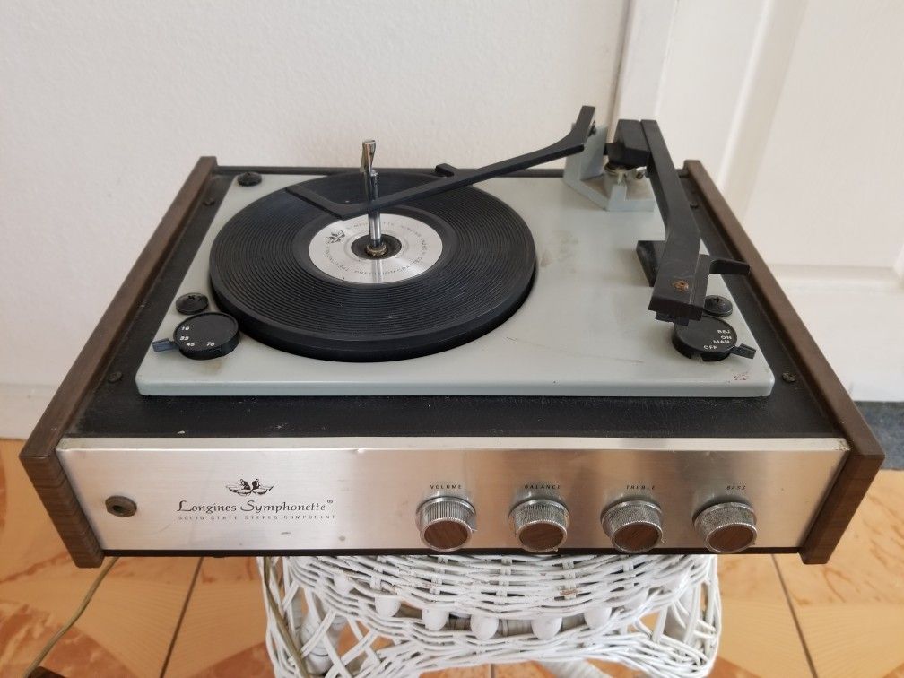 Solid state stereo component record player with speakers
