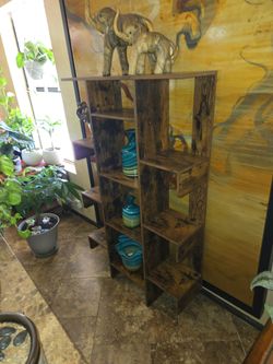 Wood curio/plant stand.   4ft 7 tall 2ft 10in wide
