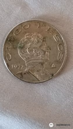 Old silver Mexican pesos