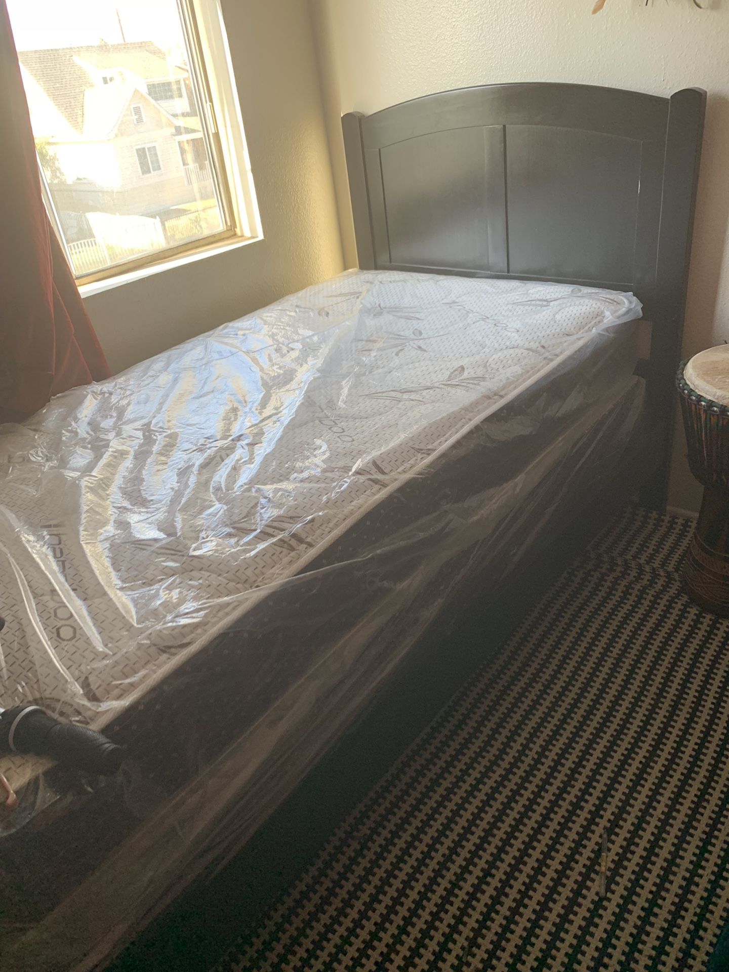 Two, Twin beds brand new still in bag both Mattress and box spring. headboard Etc. If you are interested you pick it up. Thank you.a