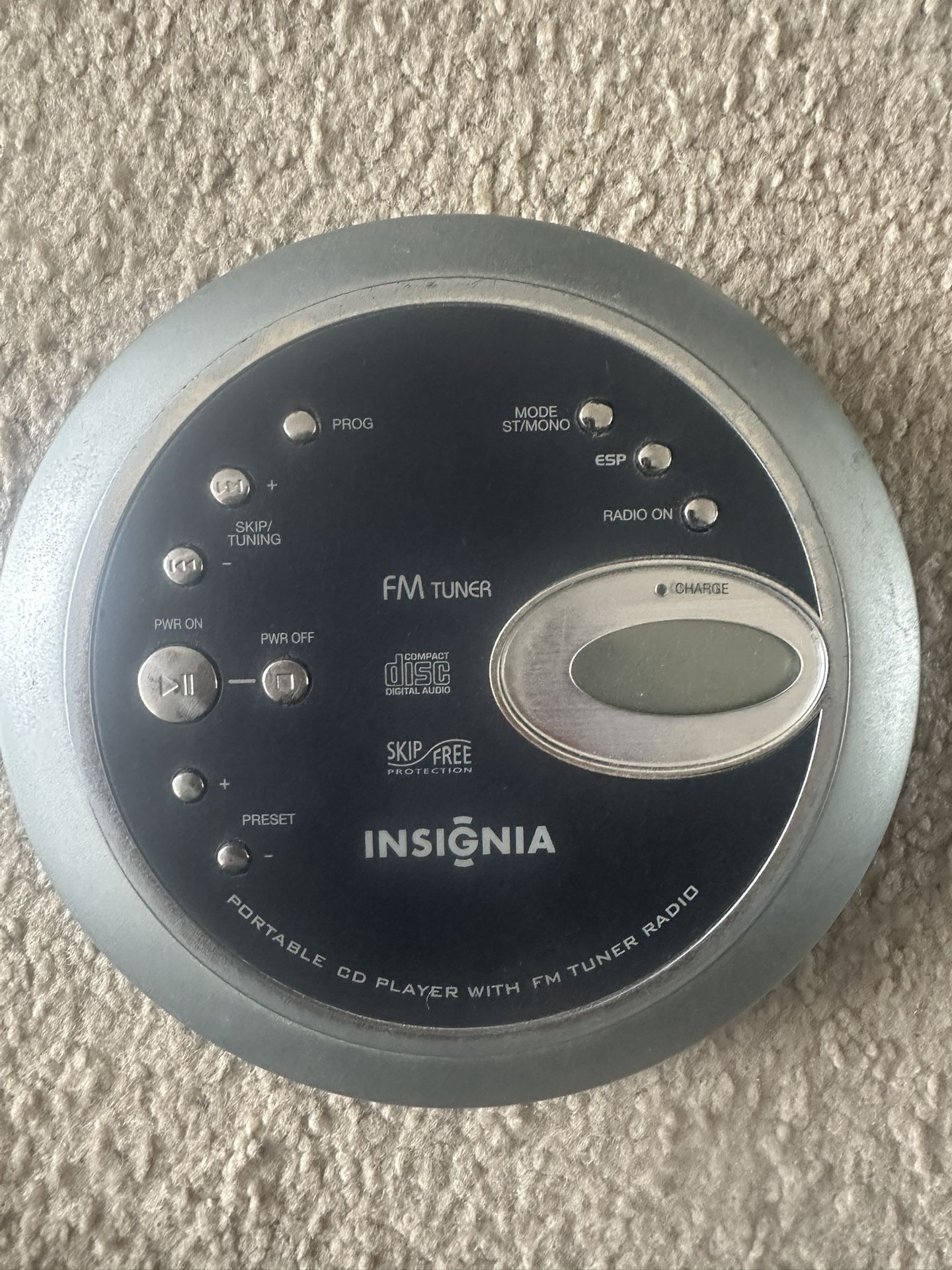 Insignia portable CD player with FM tuner and skip-free protection.. Tested. Works