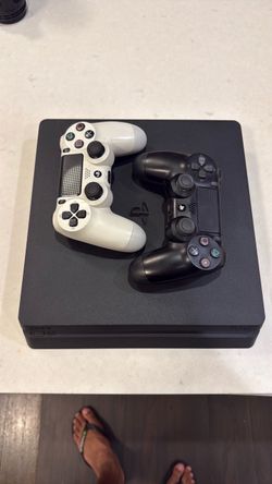 PS4 Slim 500GB + 2 Controllers — Excellent Condition