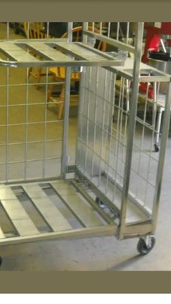Stock cart shelves fold up to carry tall or wide stuff