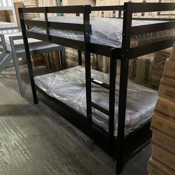 Twin bunk bed. Available in espresso, white, & grey. Bunk bed only-$220. With mattresses-$399. Assembly required. Assembly not included. Tax included.