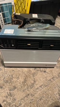 Air conditioner with outside cage