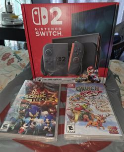 Nintendo Switch Brand New Sealed With 2 New Sealed Game And MARIO CART DOWNLOAD. Price Is Firm No Trades