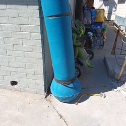 freestanding punching and kicking bag, which serves as portable training equipment for boxing, MMA, or fitness. 