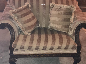 OVERSIZED DESIGNER CHAIR W/ 2 PILLOWS. 39” T x 51” Wx 33’ D