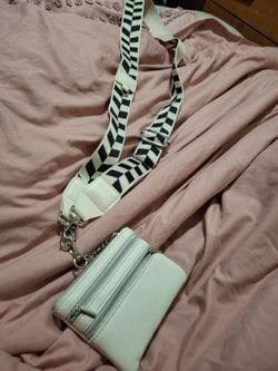 crossbody phone strap with an attached wallet pouch
