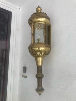 2 Brass entry sconces, approximately 3’ tall