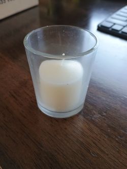 2 boxes of votive candles with holder