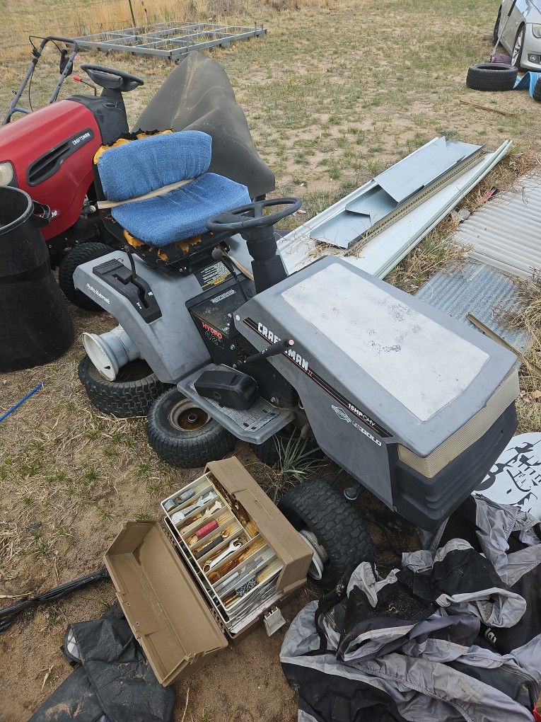 Older Model Craftsman Sit Down Mower.