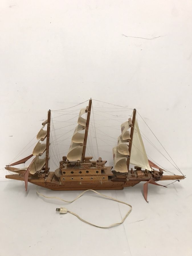 Handcrafted wooden sailboat with light (32” length , 3-1/4” width, 16” height)