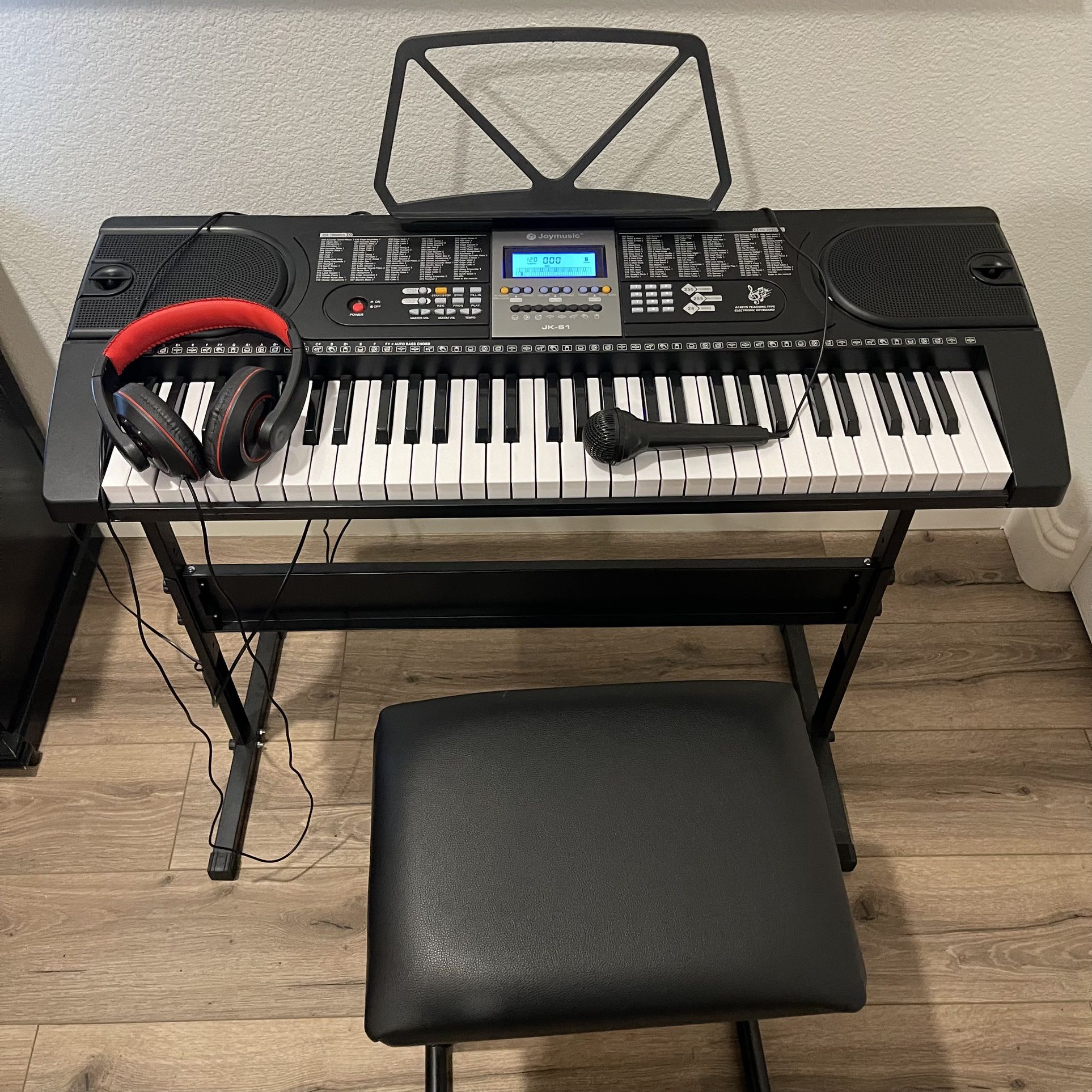 Like New Piano Set With Mic And headphone Plug In With A Table Stand!