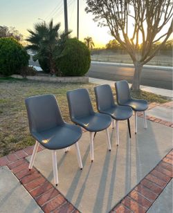 Modern-style dining/kitchen chairs with faux leather upholstery – 4 for $100