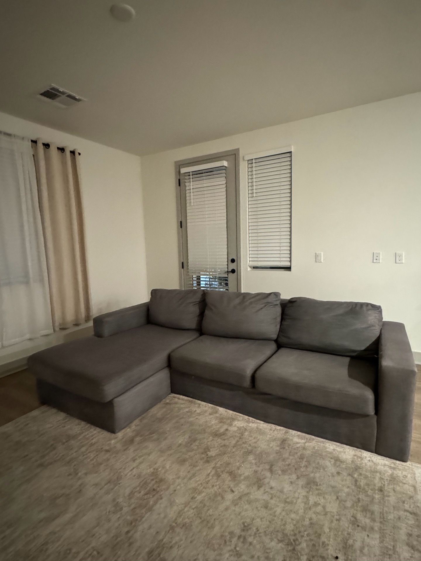 Living spaces grey couch