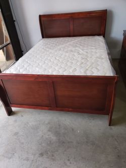 New Queen bed with a mattress $350