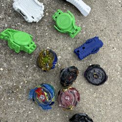 6 Beyblades and Launchers 