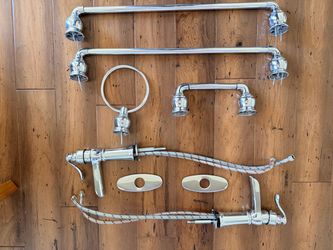Chrome bathroom Facet, Towel holder, and Toilet paper holder set.