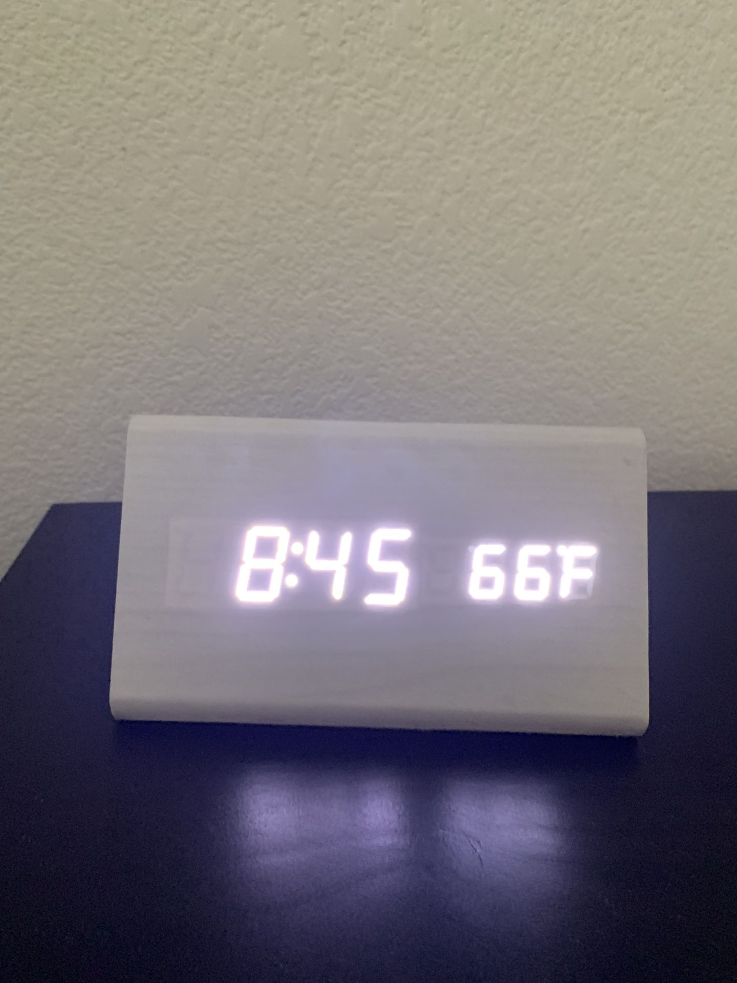 Modern white wooden digital clock with temp display