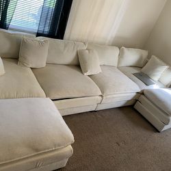 Cream 132” U-shaped couch with 2 ottomans oversized