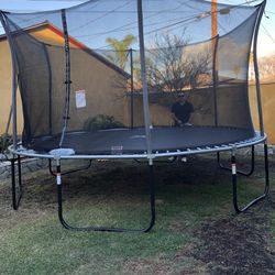 12 - 14ft Trampoline - in Storage Container