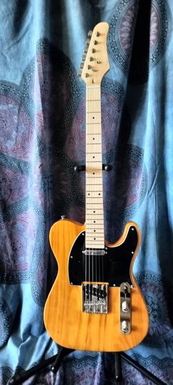 Brand new telecaster electric guitar with new bag cable and shoulder strap