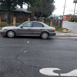 2003 hyundai sonata v6 runs strong just need  one tire 300 dollars in Tags.runs great  and a gas saver