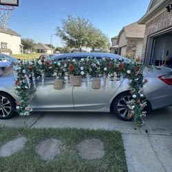 Floral Arch And Sweetheart Table Arch With Lamps