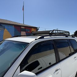 Roof rack carrier