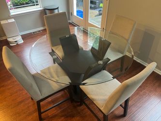 Glass table with 4 chairs