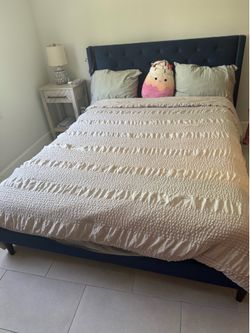 Queen bed with mattress and night stand