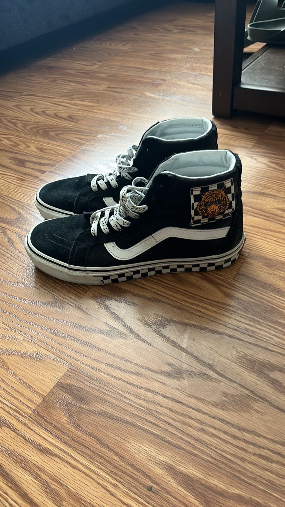 Vans Black and White High-Tops with Graphic Details