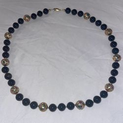 vintage style black and gold beaded necklace with cloisonné