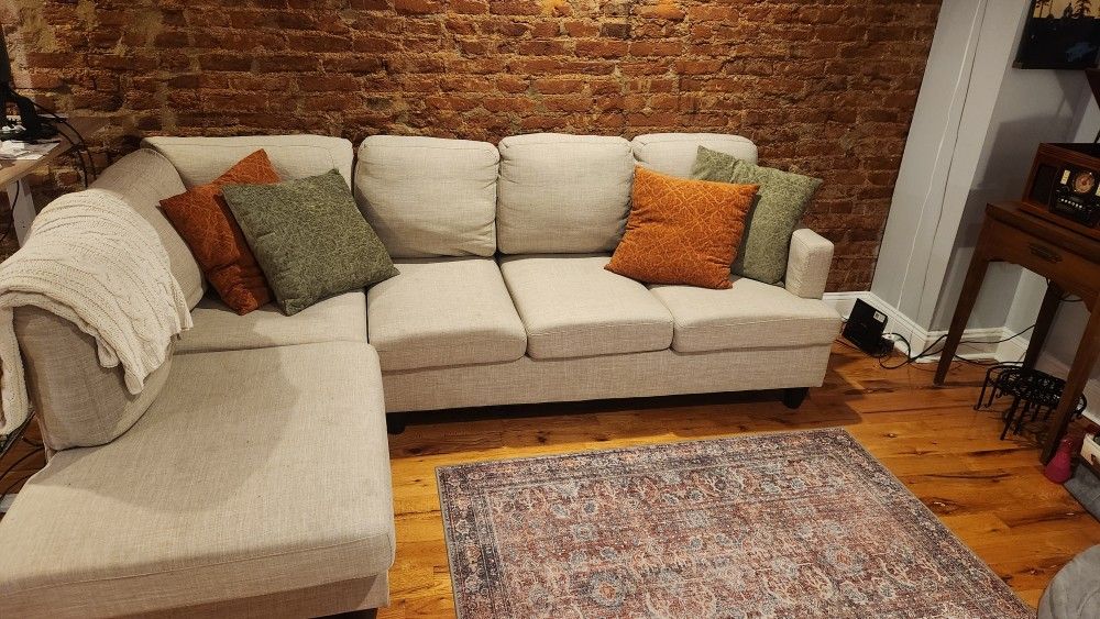 NEW BEIGE COUCH