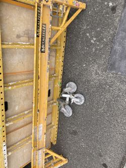Home Depot Baker Metal Tech Jobsite Series Steel Yellow Scaffolding platform rolling on wheels In great shape ! Also available for sale: Milwaukee H