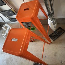 Orange Metal Matching Stools